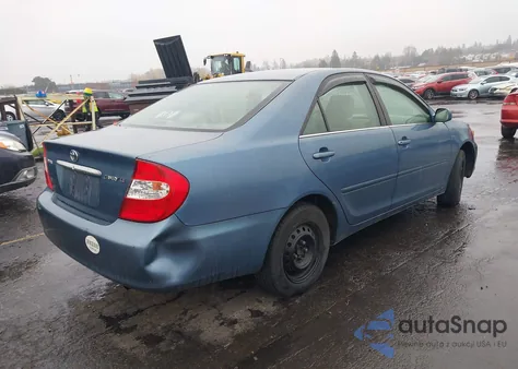 2003 Toyota Camry Le z USA, uszkodzony, nr VIN 4T1BE32K73U208203